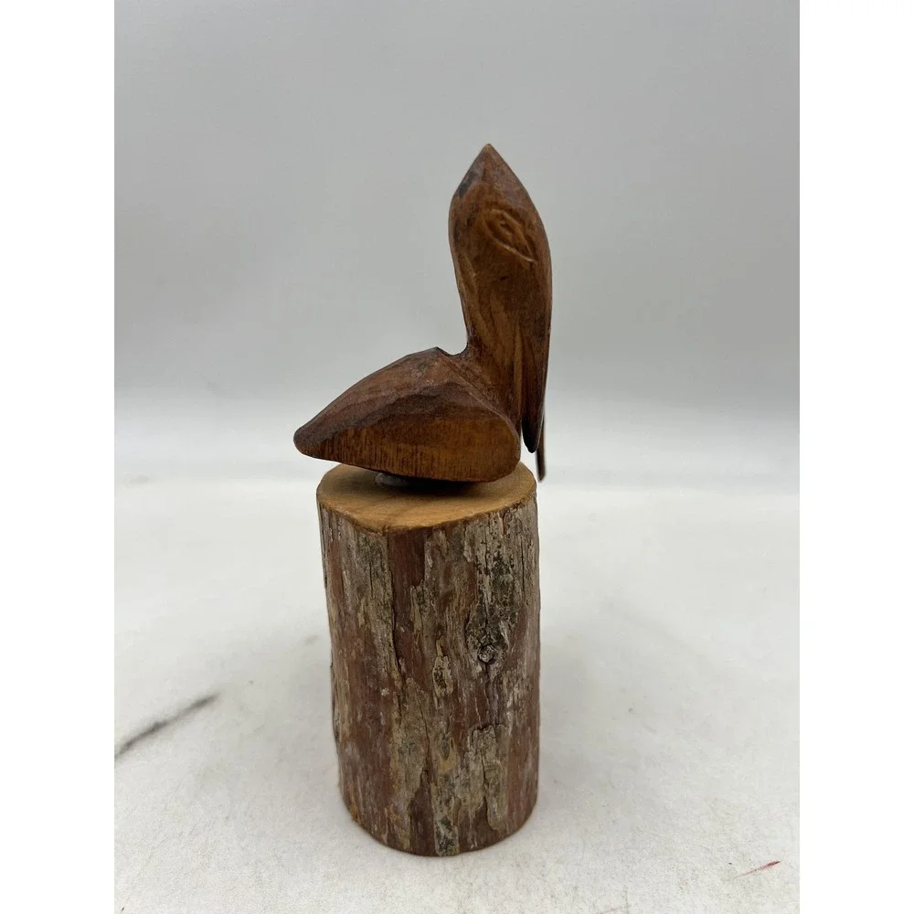 Hand Carved Wood Pelican Pair Figurines on Log Bases Rustic Coastal Folk Art
